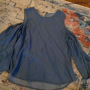 Beautiful denim long sleeve shirt with cut outs on shoulders, never worn